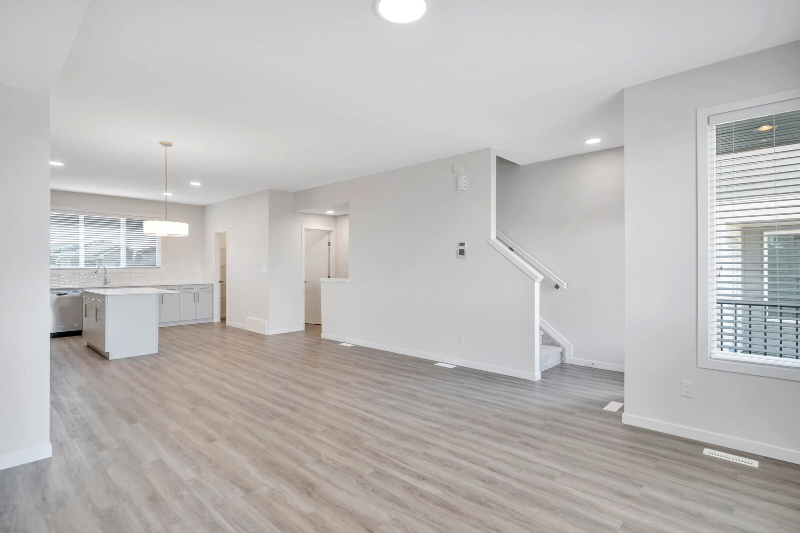 Open living and kitchen in a Boreal Drive townhouse, Leduc