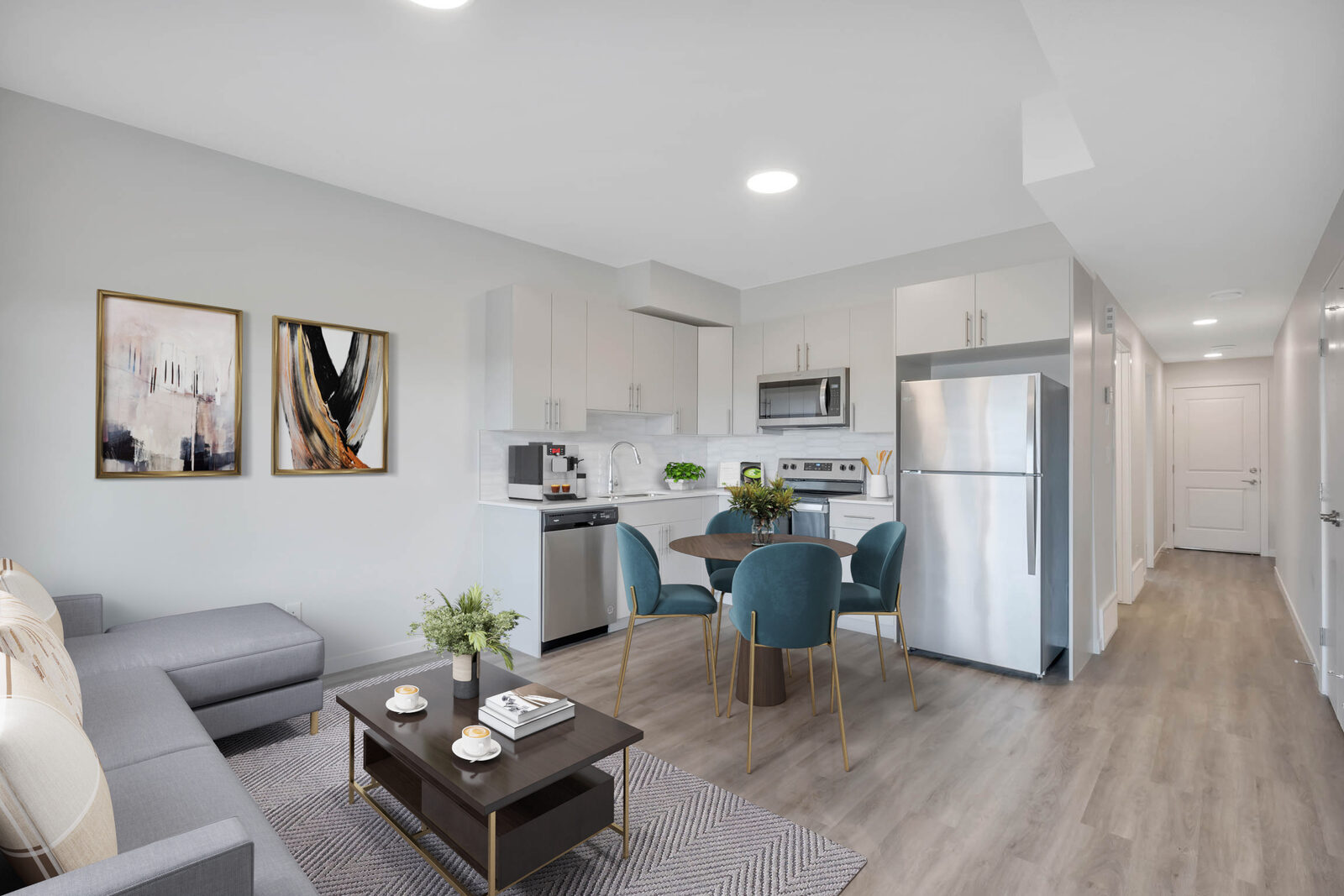 Boreal Drive legal one-bedroom suite open living area and kitchen, virtually staged