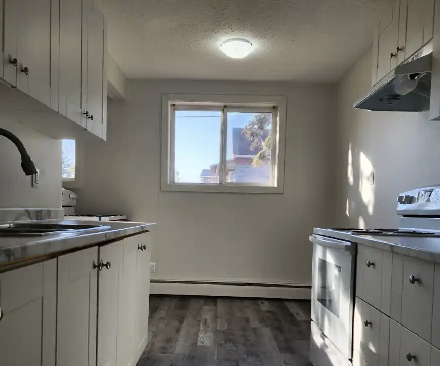 Updated kitchen with white cabinetry